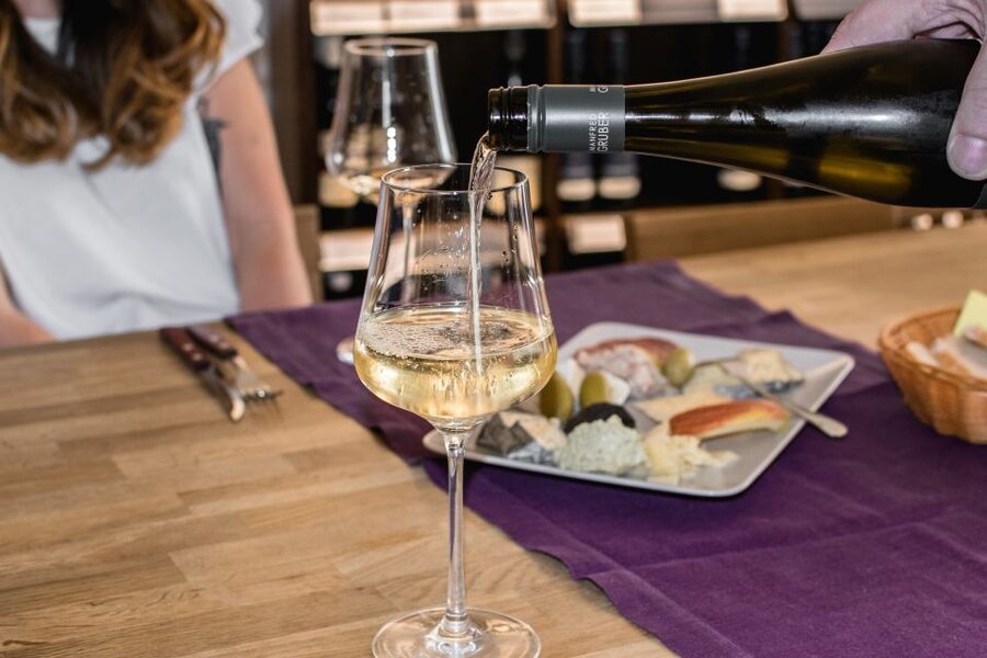 Salzburg: Guided Wine Tasting in a Hidden Wine Bar - Entering the shop and finding the tasting