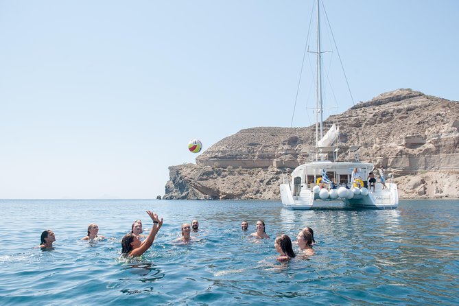 Santorini Catamaran Cruise with Fresh Meal and Open Bar - Sailing around the active volcano