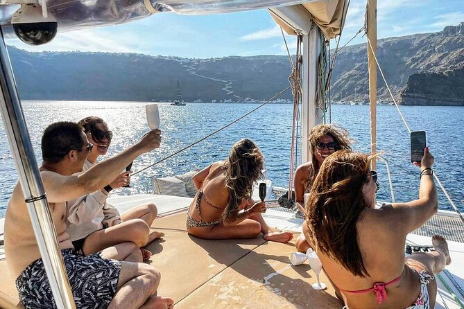 Santorini Catamaran Cruise: with Lunch, BBQ, Open Bar, Transfers - Mesa Pigadia Beach and the Greek lunch