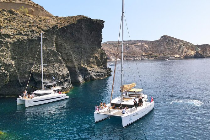 Santorini Catamaran Cruise: with Lunch, BBQ, Open Bar, Transfers - Seeing Santorini from the caldera side