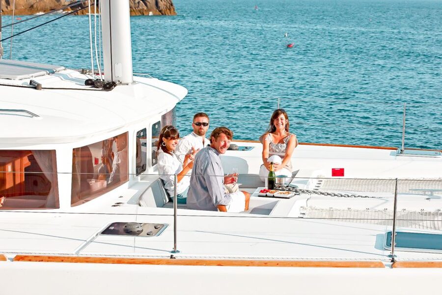 Santorini: Catamaran Tour with BBQ Meal and Unlimited Drinks - Hot Springs and the volcanic heart of Santorini