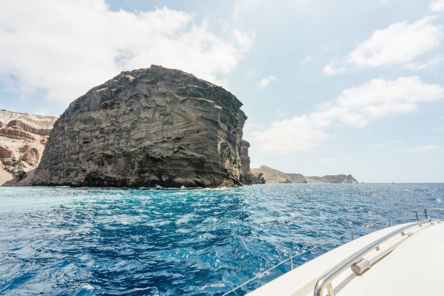 Santorini: Luxury Catamaran Day Trip with Meal and Open Bar - Crew service and onboard atmosphere