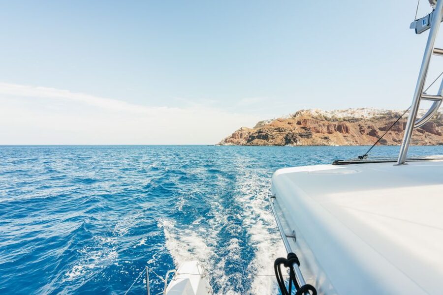 Santorini: Luxury Catamaran Day Trip with Meal and Open Bar - How much value does $129 offer?
