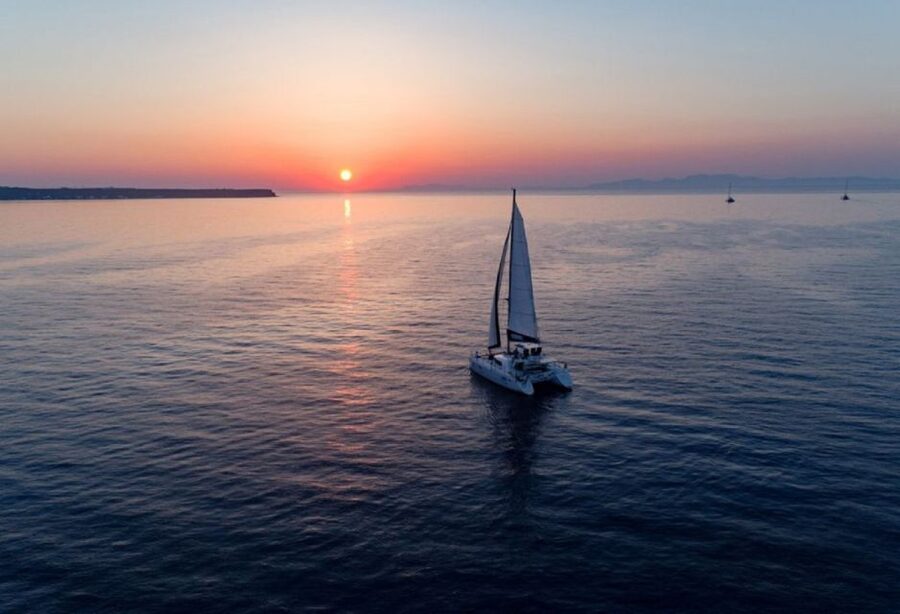Santorini: Luxury Sunset Cruise with Dinner & Open Bar - Red Beach, White Beach, Black Mountain Beach, and the Lighthouse