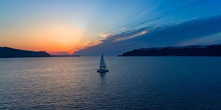 Santorini: Luxury Sunset Cruise with Dinner & Open Bar - Greek BBQ dinner with wine, beer, and dessert