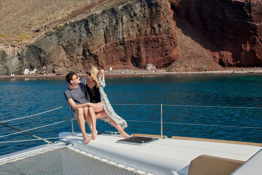 Santorini: Platinum Catamaran Cruise w/ BBQ Meal & Open Bar - Mésa Pigádia: the first real water stop