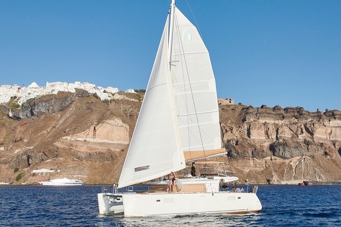 Santorini Platinum Catamaran Cruise with Meal, BBQ and Open Bar - Leaving Vlichada for Red Beach and White Beach