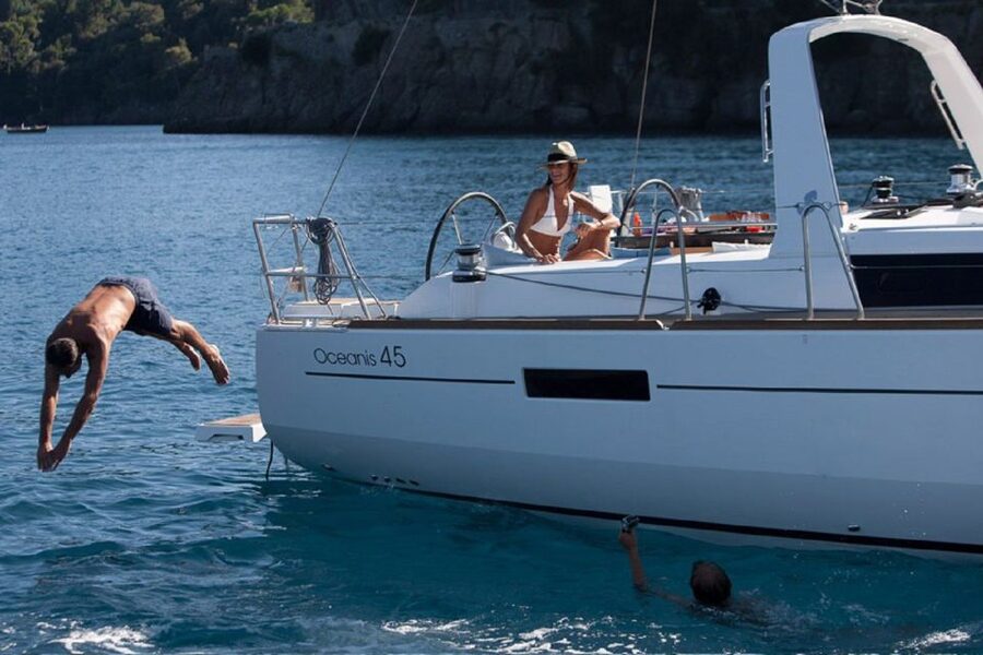 Santorini: Private Caldera Sailing Trip with Open Bar & Meal - Red Beach and the first southern coast views