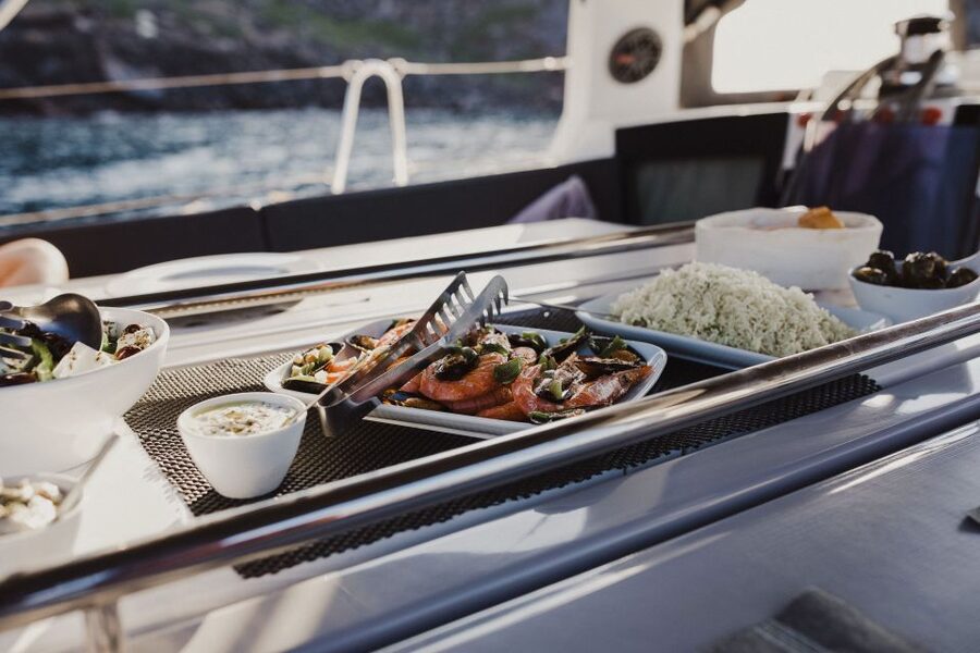 Santorini: Private Caldera Sailing Trip with Open Bar & Meal - White Beach is best viewed from the water