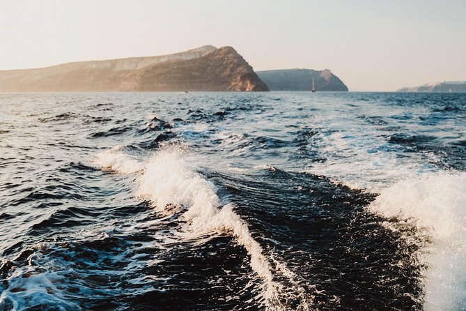 Santorini Private Catamaran Cruise with BBQ, Open Bar & Transfers - Thirasia and the quieter side of the caldera