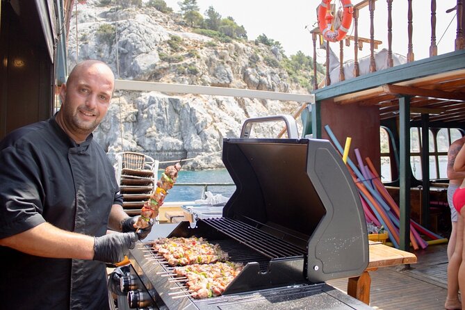 Sun & Sea 6 Hour All Inclusive Swimming Cruise with Greek BBQ & Unlimited Drinks - Upper deck bean bags versus lower deck benches