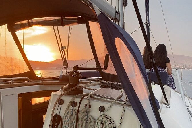 Sunset Sailboat Tour along the Coast with Open Bar - Timing, weather, and cancellation details