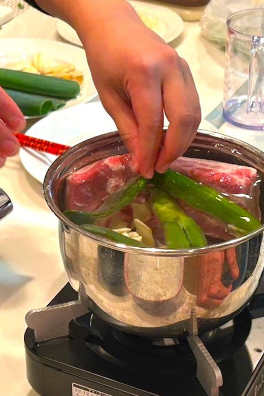 Tokyo: Sushi and Ramen Cooking Class with Sake Pairing Set - Learning to shape nigiri sushi
