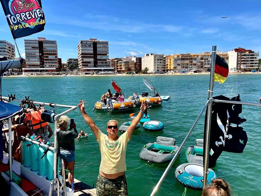 Torrevieja: Pirate Sunday Party Boat Tour - Joining the catamaran party offshore