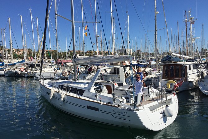 Wonderful 2 Hour Sailing trip including open bar and Pinchos - Leaving Port Vell with Barcelona’s working harbor in view